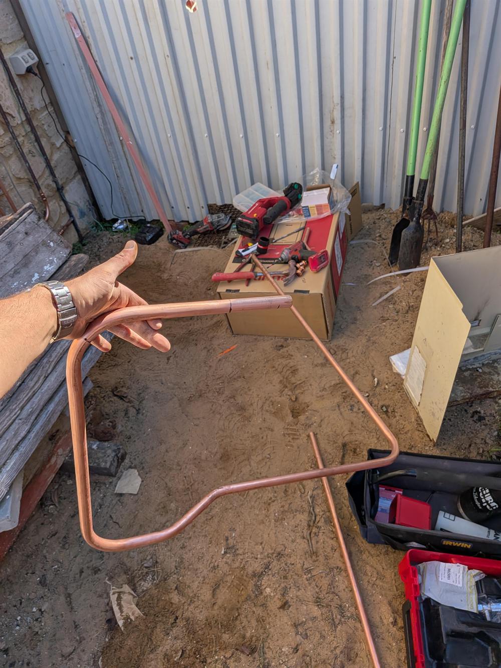 A hand-formed copper pipe set, bent on site